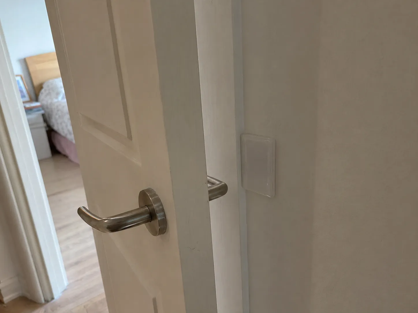 Door handle wall protector pad