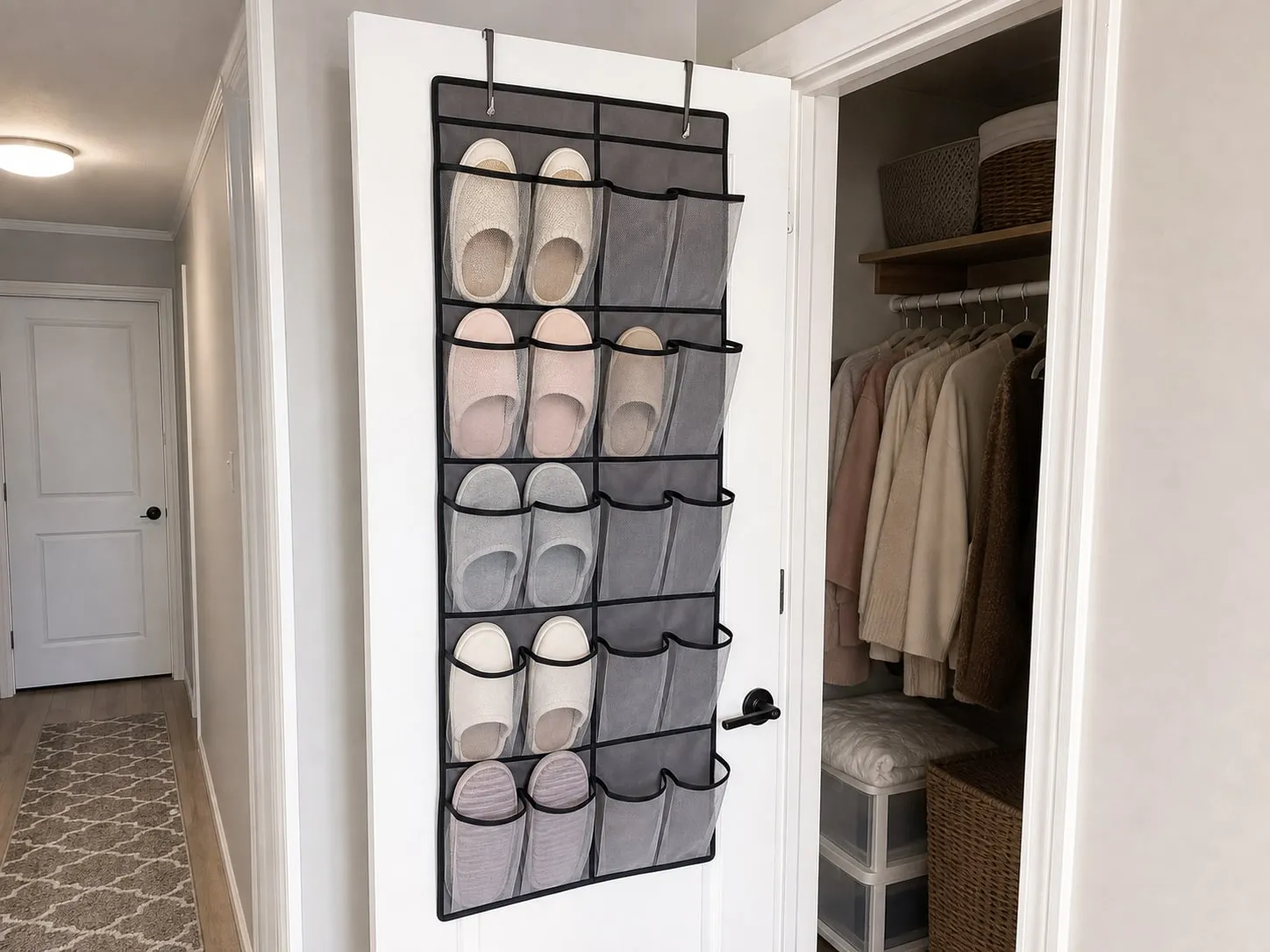 Fabric mesh over-door shoe pocket organizer hanging on a closet door with light low shoes in several pockets